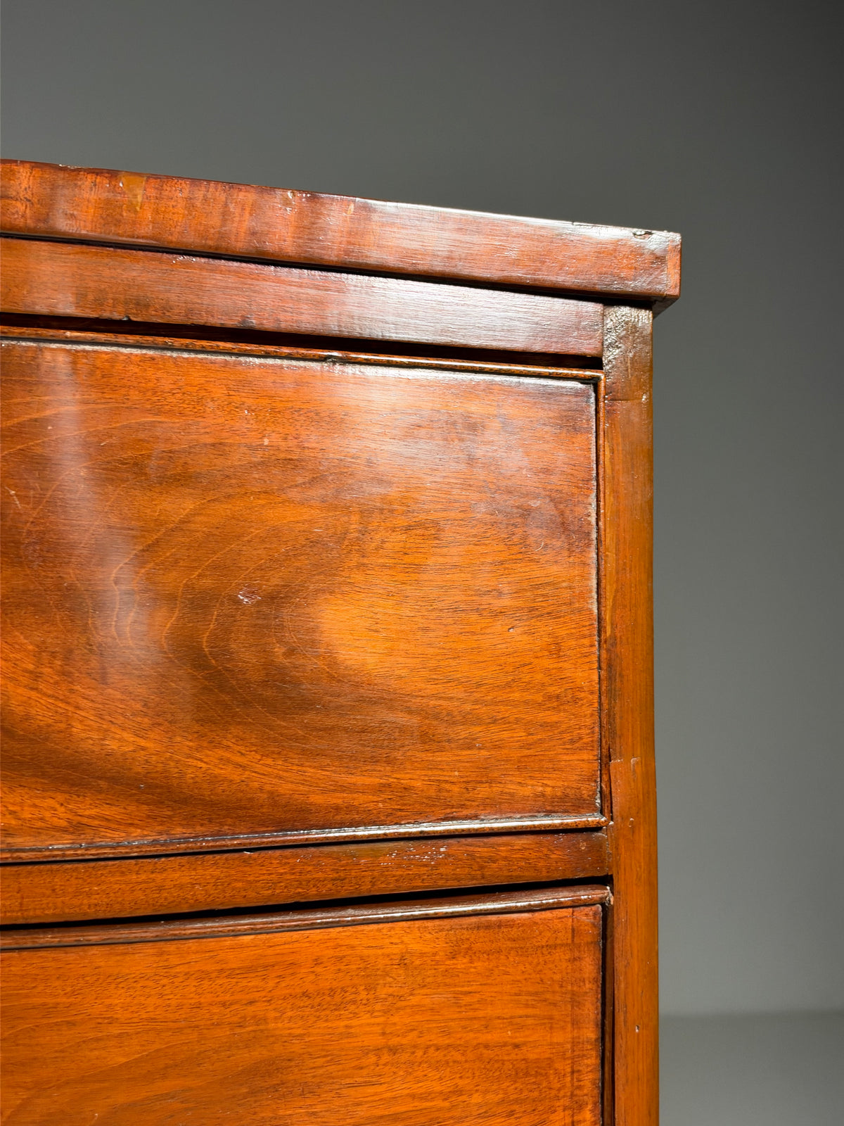 English bow-front chest of drawers in mahogany