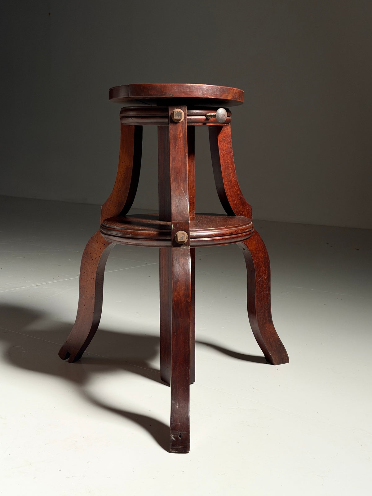 Mahogany sculpture stand