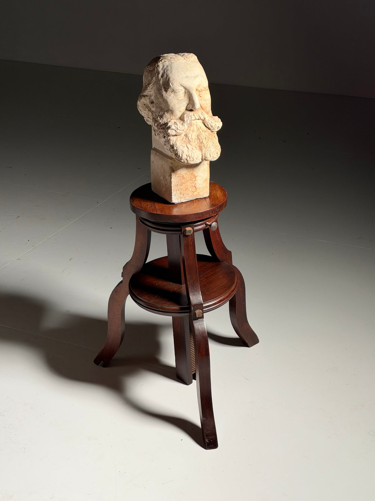 Mahogany sculpture stand