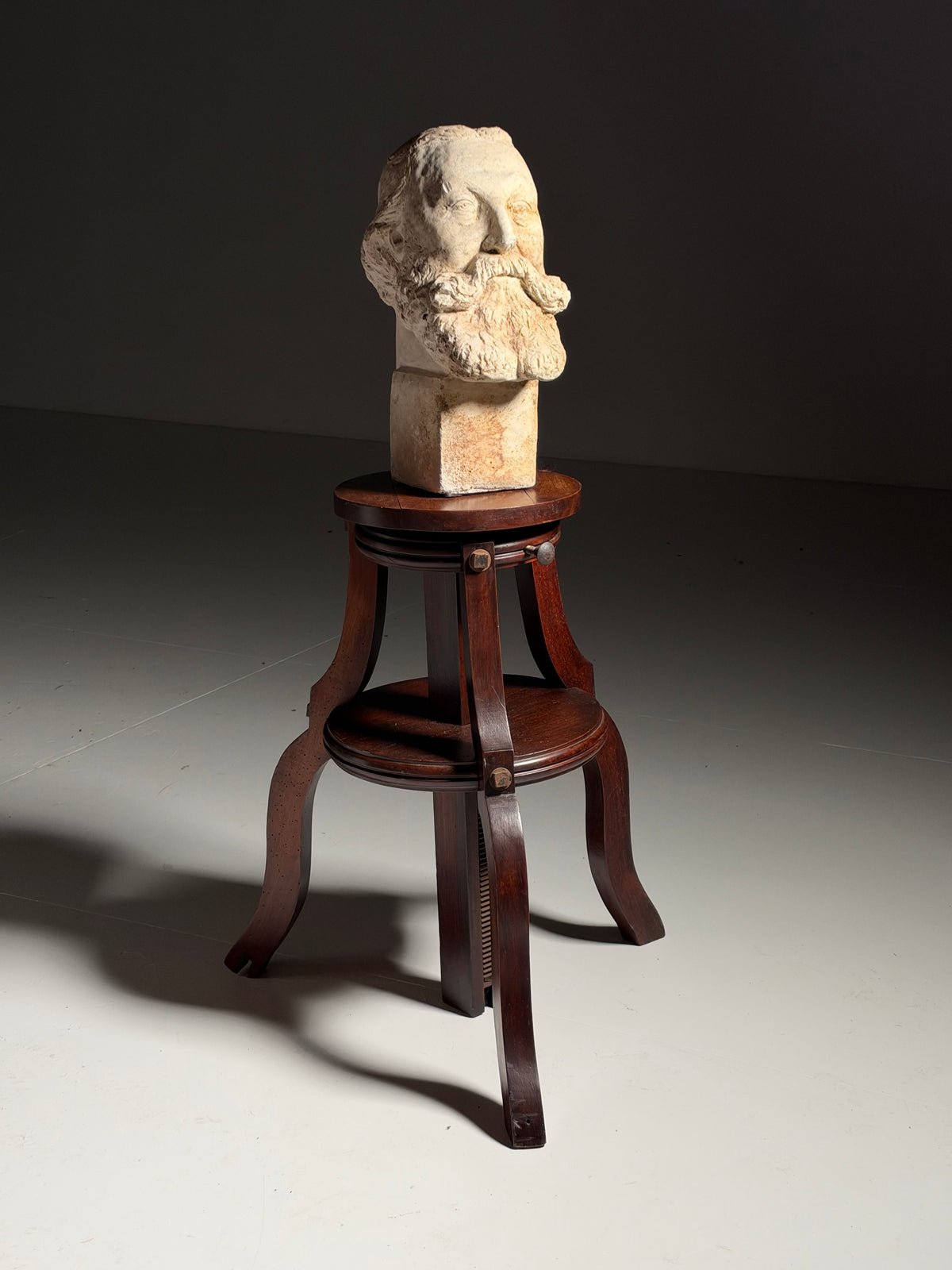 Mahogany sculpture stand