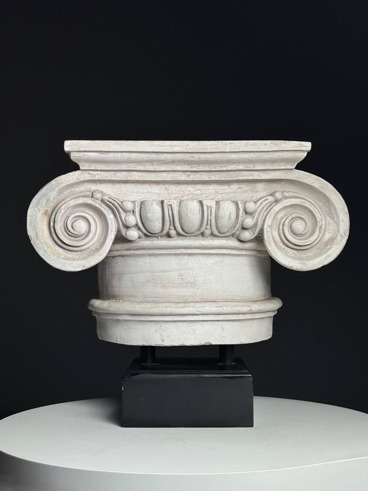 Ionic Plaster Capital on Black Plinth, England, photo 1