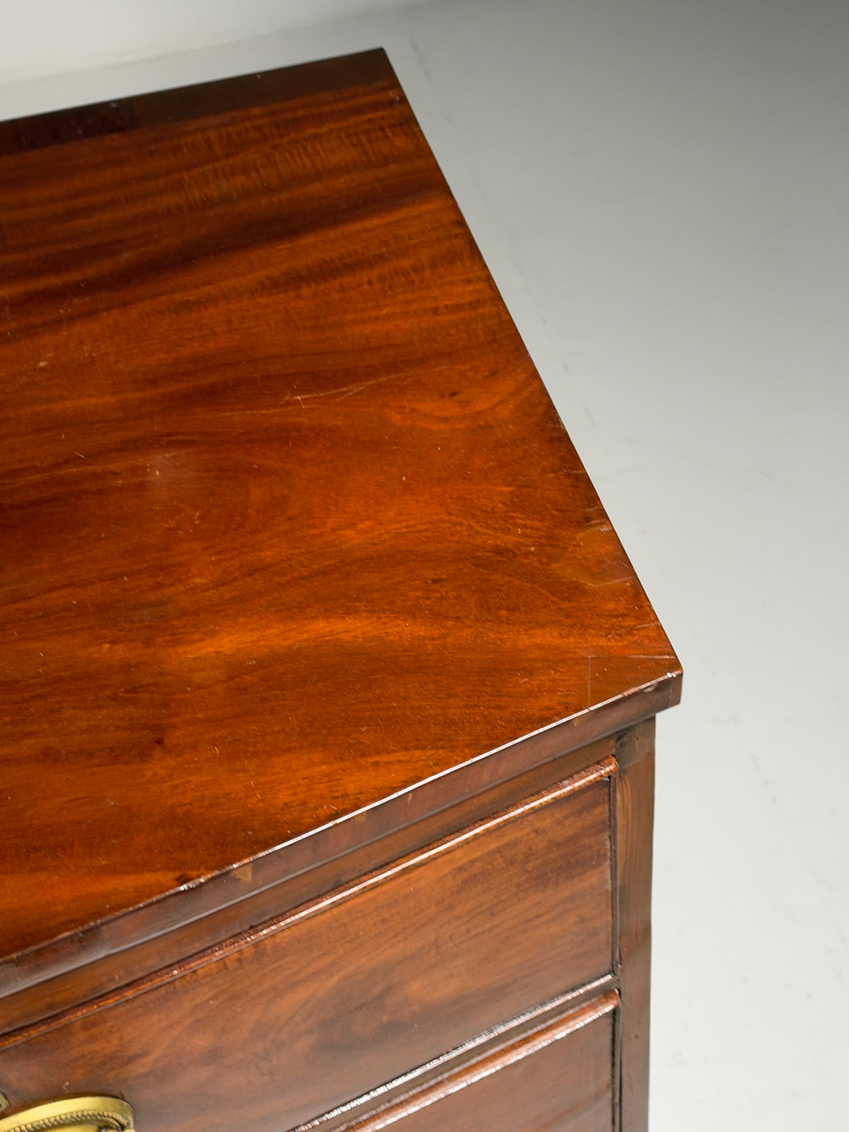 English bow-front chest of drawers in mahogany