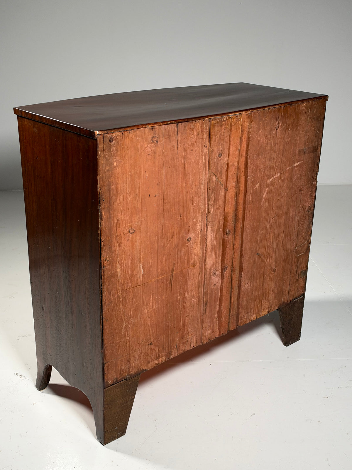 English bow-front chest of drawers in mahogany