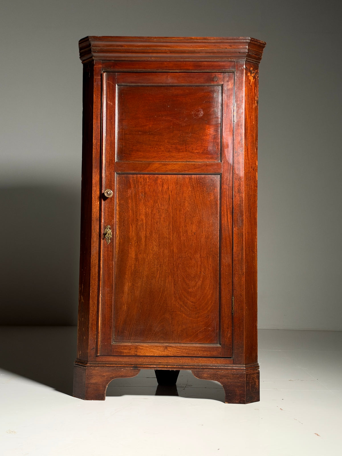 19th century English mahogany corner cabinet