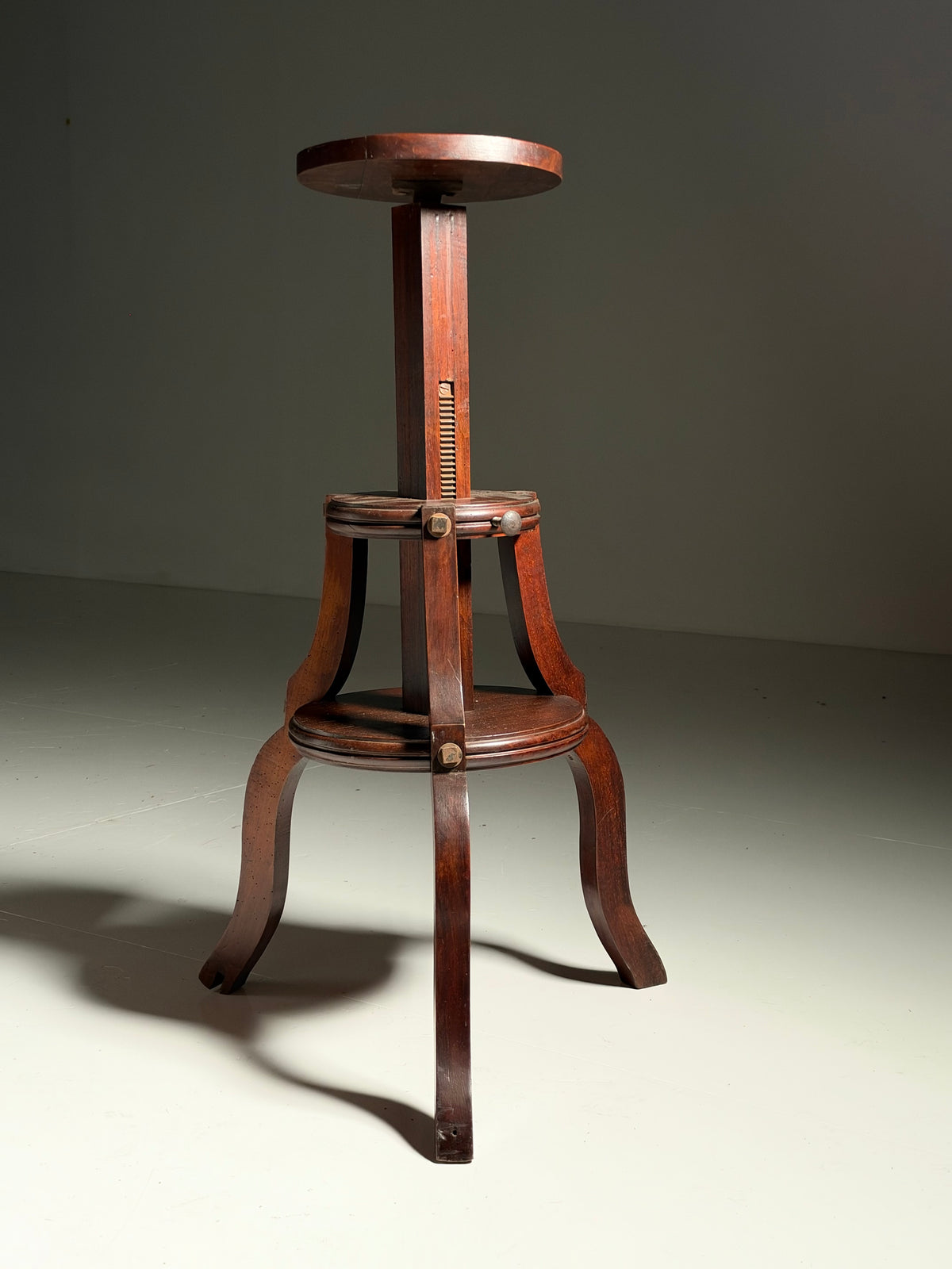 Mahogany sculpture stand