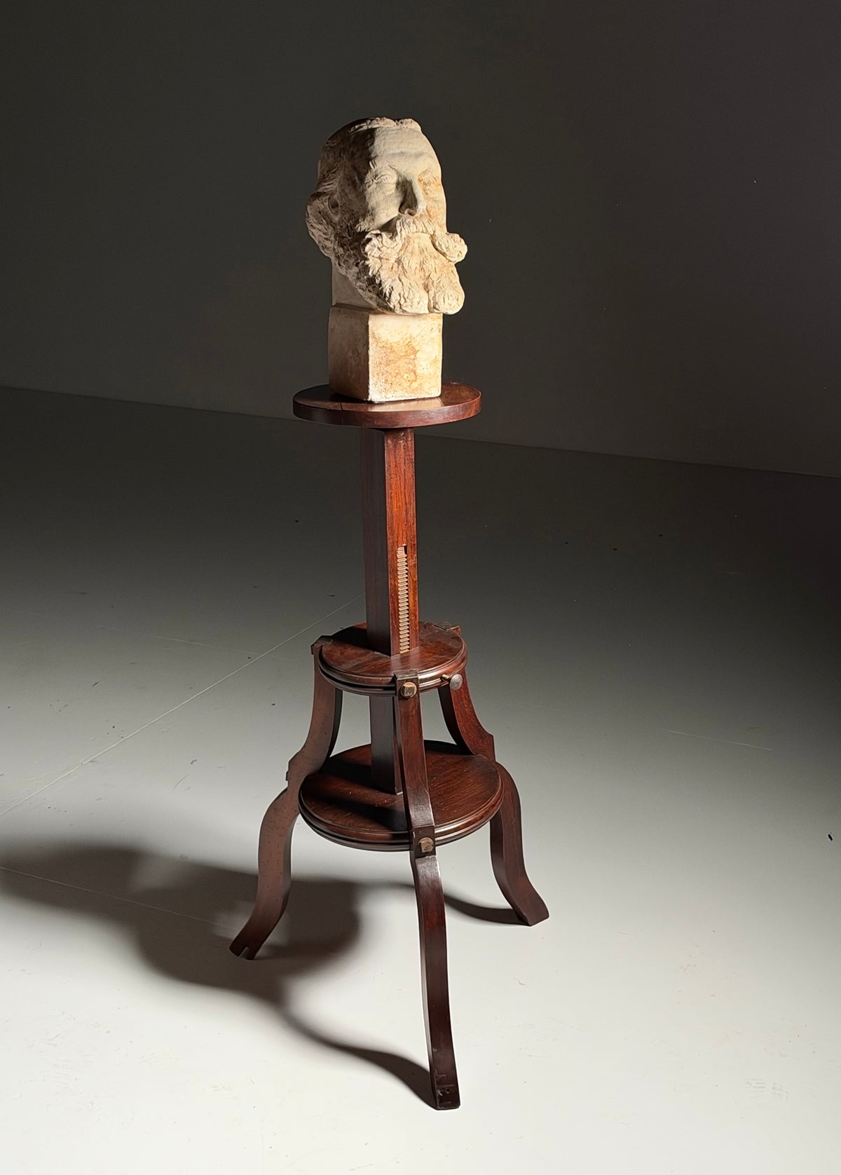 Mahogany sculpture stand