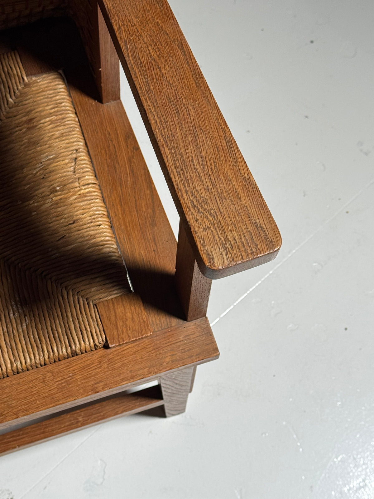 Armchair with a woven backrest