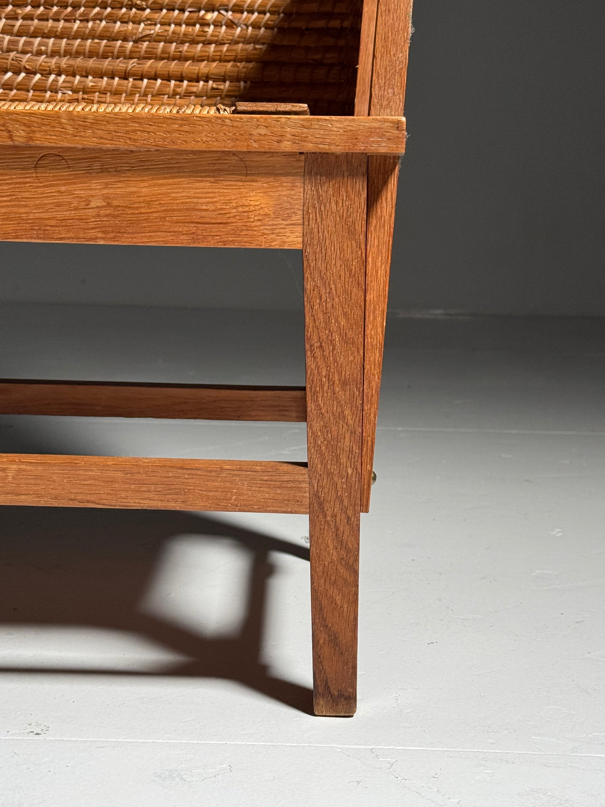 Armchair with a woven backrest